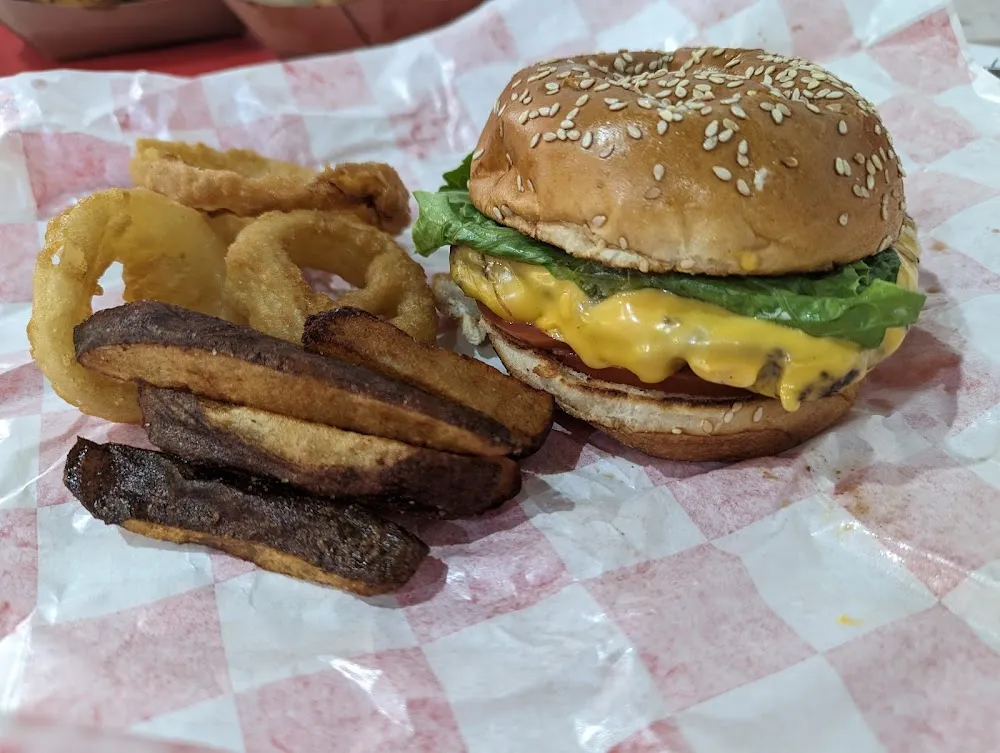 The Jazzy 1 3lb Pictured with Fries and Onion Rings from Another Order